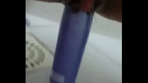Best Stuffing the shampoo into the pussy and the growing clitoris fine Tube