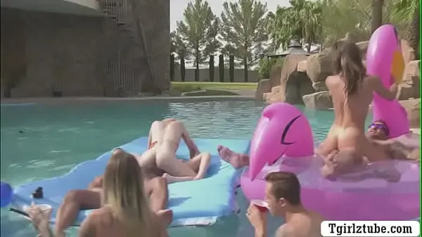 Busty shemales are in the swimming pool with many guys that,they decide to do orgy and they start kissing each is,they suck their big cocks passionately and they let them bareback their wet ass too Tiub halus terbaik